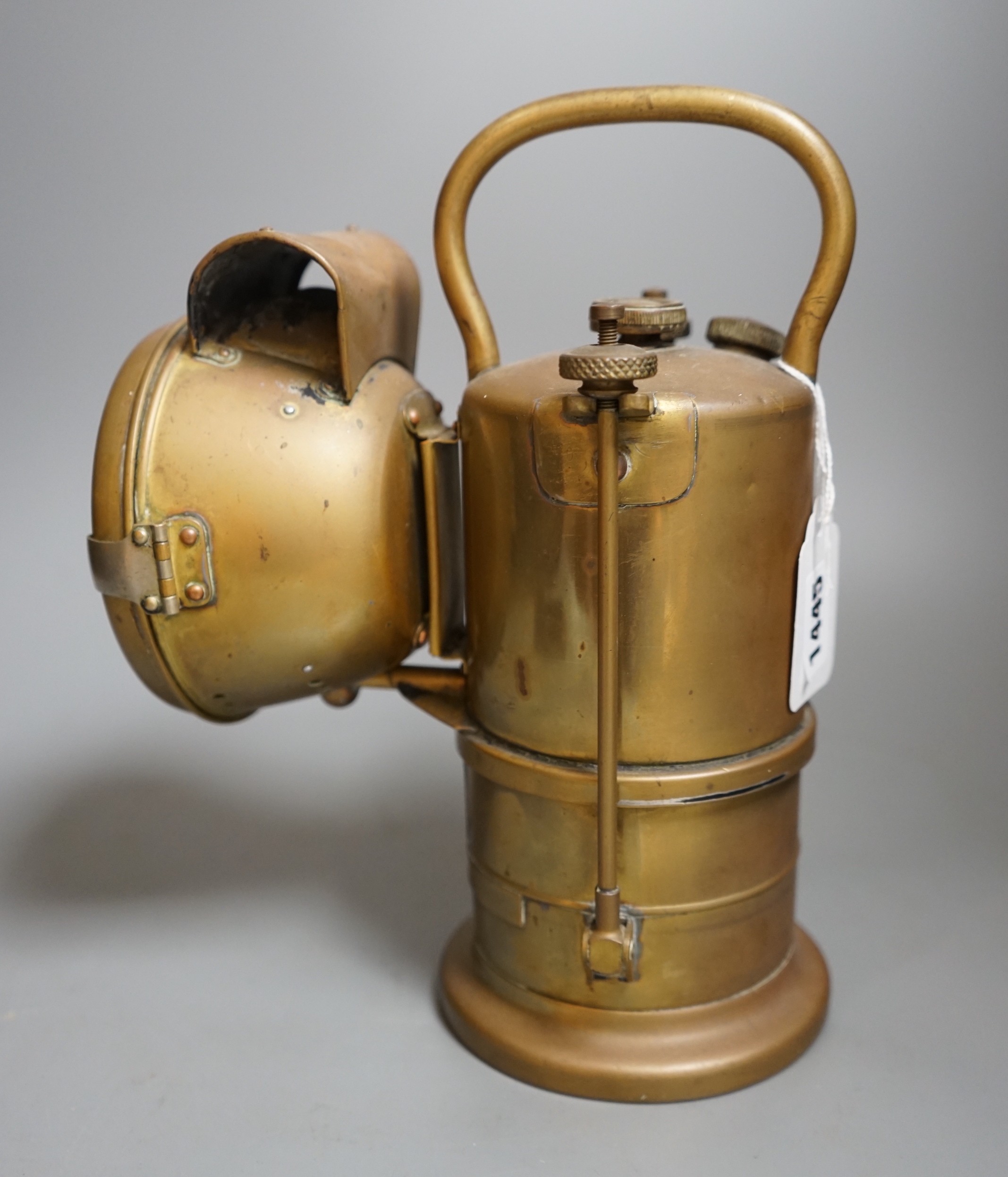 A LNWR railway inspection lamp, company ceased trading in 1922, 26cms high